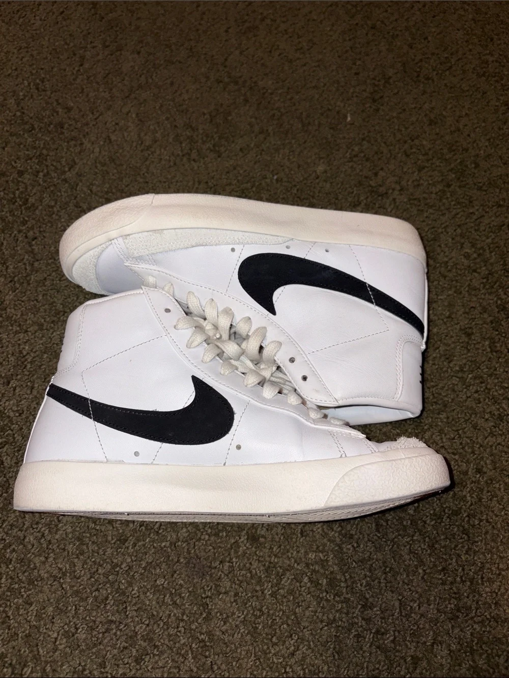 Nike Women's White High-Top Sneakers with Black Swoosh and Orange Logo Accents